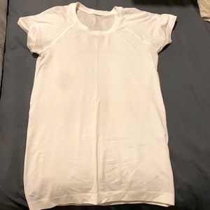 2 white and grey lululemon tops